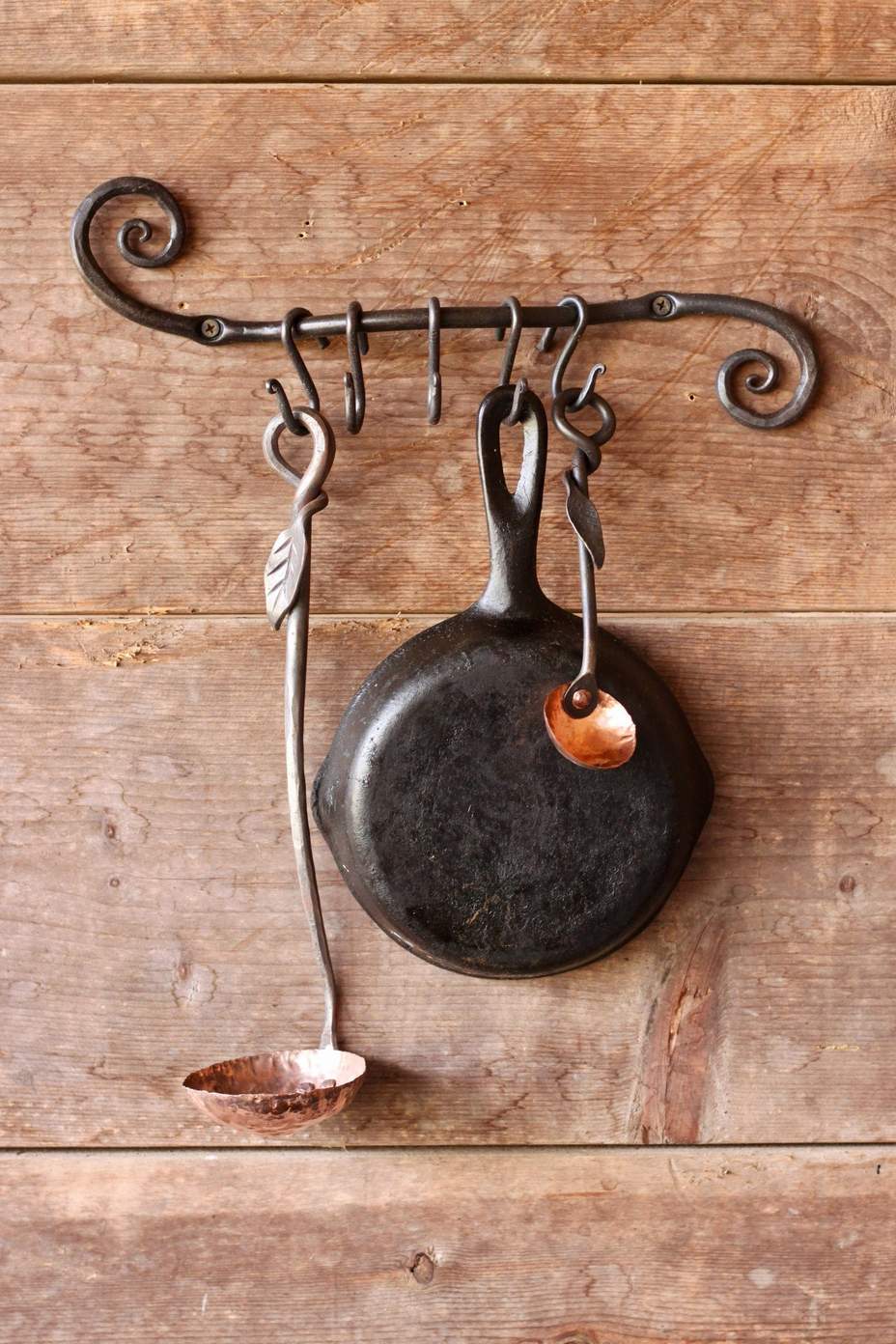 https://wroughtworks.com/images/wrought-iron/wrought-iron-pot-rack-scroll.jpg